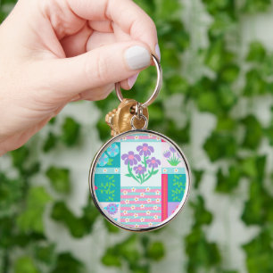 Lebendiges blühendes Blumendesign Schlüsselanhänger