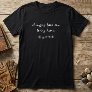 Lebensveränderung durch liebevolle häusliche Blume T-Shirt