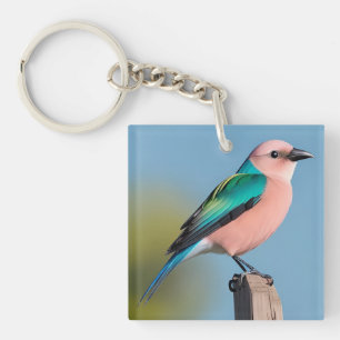 Lebhaft gefärbter Vogel auf einem Holzpfosten sitz Schlüsselanhänger
