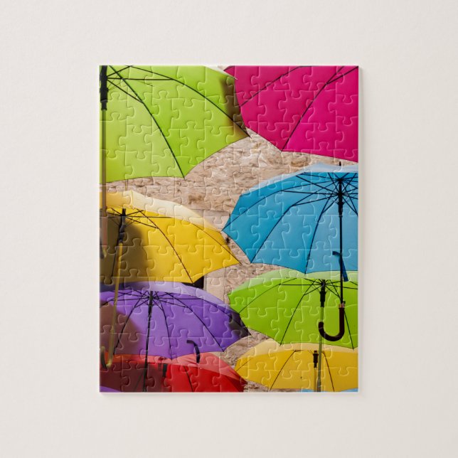 Lebhafte und farbenfrohe Sonnenschirme Puzzle (Vertikal)