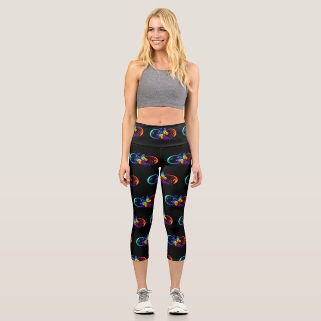Lebhafte Unendlichkeit mit Regenbogenschmetterling Capri Leggings (Vorderseite)