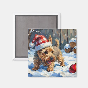 Lebhafter Cairn Terrier Hund gräbt nach Weihnachte Magnet