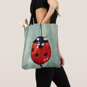 Lebhafter Ladybug auf grünem Hintergrund, Aquarell