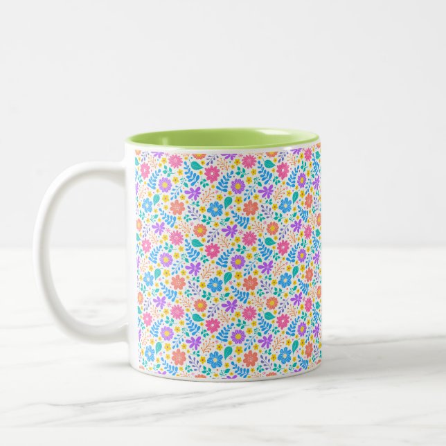 Lebhaftes Blumendesign, farbenfrohe Blume Tasse (Links)
