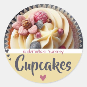 Lebhaftes, gelbes Cupcake Kuchen Backbacken Foto L Runder Aufkleber