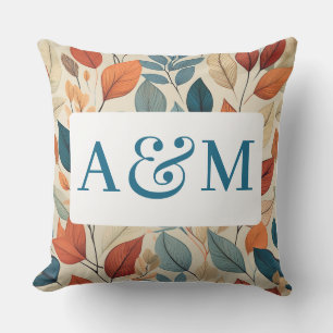 Lebhaftes Leaf-Muster mit zwei Monogrammen Kissen