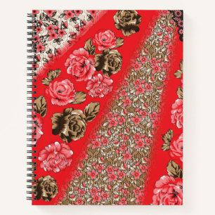Lebhaftes rotes Gewebe, mit viel Blumen und Notizbuch