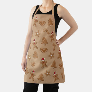 Lebkuchen-Weihnachtsplätzchen-Formen auf Braun Schürze