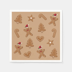 Lebkuchen-Weihnachtsplätzchen-Formen auf Braun Serviette