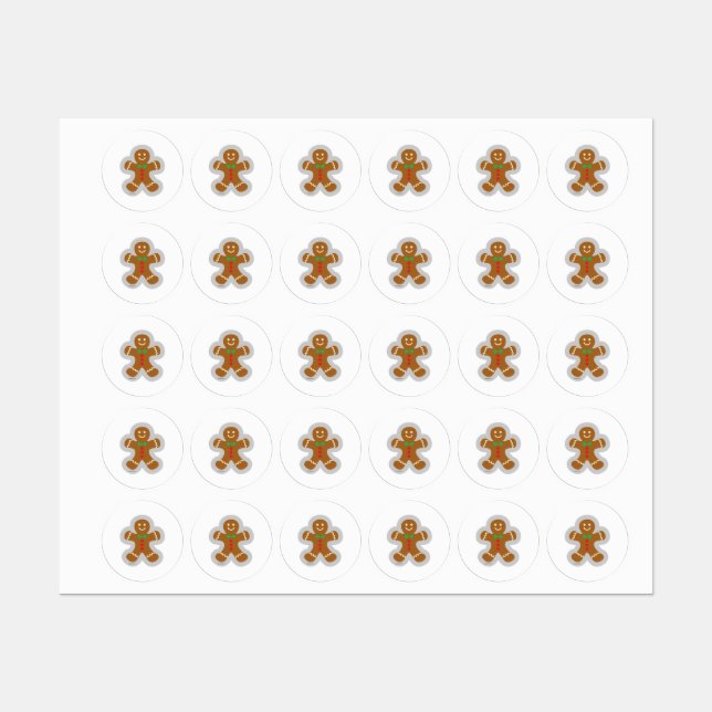 Lebkuchenmann, der den Engel im Schnee bildet Etiketten (Blatt)