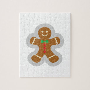 Lebkuchenmann, der den Engel im Schnee bildet Puzzle