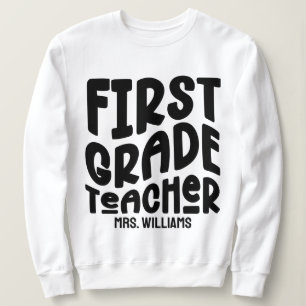 Lehrer der ersten Klasse Schwarzes Schriftzug-Desi Sweatshirt