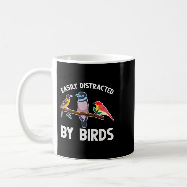 Leicht abgelenkt durch Vogelbeobachter Kaffeetasse (Links)
