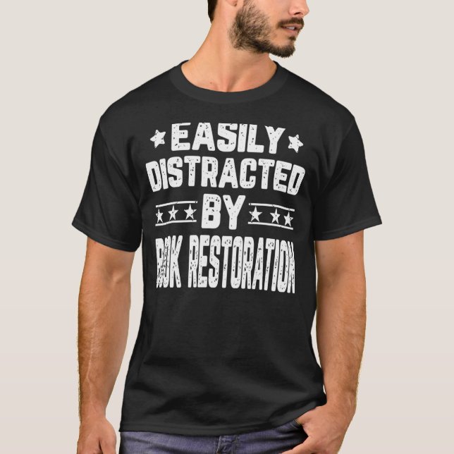Leicht ablenkbar durch das Buch Rebindi T-Shirt (Vorderseite)