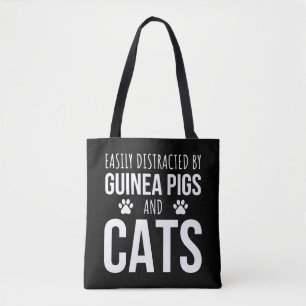 Leicht von Guinea und Katzen abgelenkt