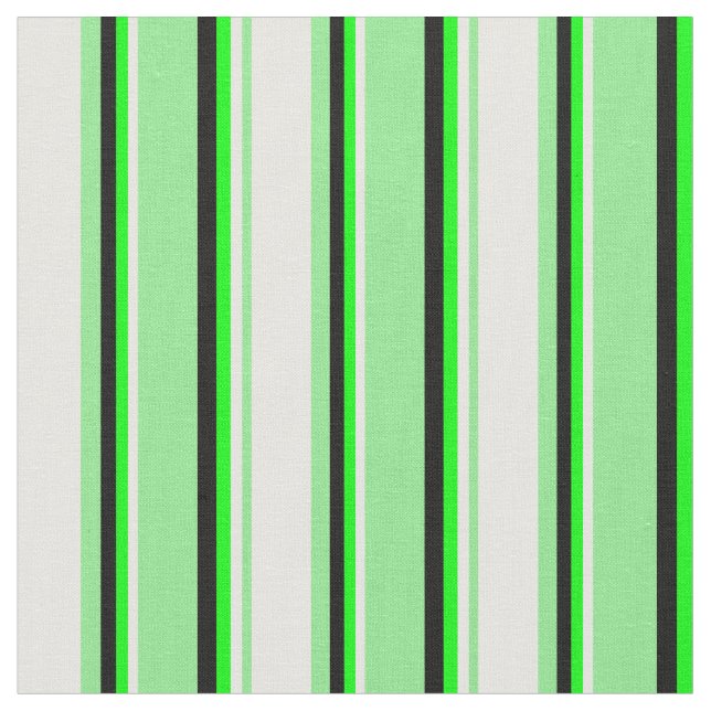 Leichte, grüne Creme, Limone und schwarze Streifen Stoff (Nahaufnahme)