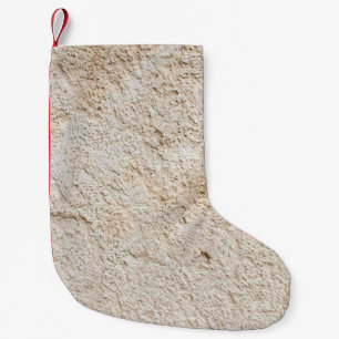 Leichte Textur der alten antiken Wand, Schicht von Kleiner Weihnachtsstrumpf