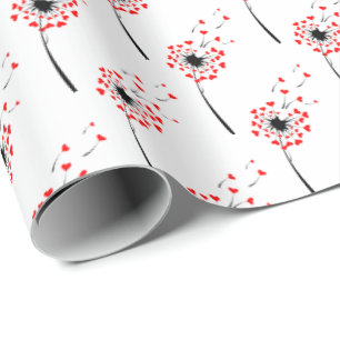 Leuchte aus rotem Herzen auf weiß Geschenkpapier