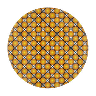 Leuchtende goldene Punkte Schwarz-weißes Gittermus Schneidebrett