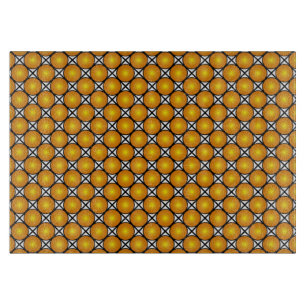 Leuchtende goldene Punkte Schwarz-weißes Gittermus Schneidebrett