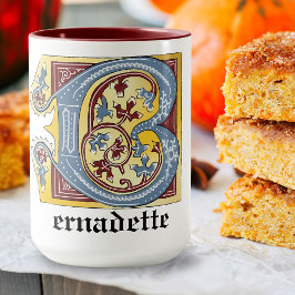 Leuchtender Buchstabe B des mittelalterlichen blau Tasse