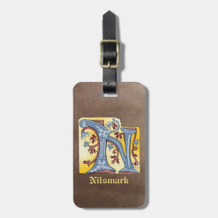 Leuchtender Buchstabe N des mittelalterlichen blau Gepäckanhänger