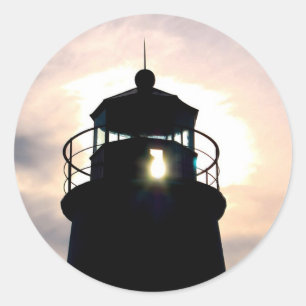 Leuchtturm am Sonnenuntergang Runder Aufkleber