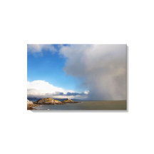 Leuchtturm und nahender Sturm