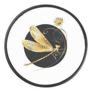 Libelle golden in schwarzem Kreis Eishockey Puck