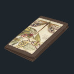 Libellen mit Blätter und Obst Trifold Geldbörse<br><div class="desc">Libellen schweben über Blätter mit Frucht in diesem Stück von Vision Studio. Das Trio der Insekten passt wunderbar zu ihrem Hintergrund und verleiht diesem Ausdruck eine lebensähnliche Qualität. Bestellen Sie noch heute Ihr Exemplar!</div>