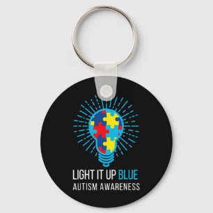 Licht auf blauer Autismus Bewusstsein Ribbon Puzzl Schlüsselanhänger