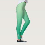 Licht in Dunkelgrüne Farbe mit eleganter Monogramm Leggings<br><div class="desc">Das elegante helle bis dunkelgrüne Farbverlauf zeichnet sich durch ein elegantes Monogramm in einem weißen dekorativen Schriftart am unteren Ende des rechten Beins aus. Personalisieren Sie es mit Ihrem Initial in der Sidebar. Fügen Sie Ihrem Kleiderschrank einen modernen Look hinzu. Klicken Sie auf den Link "Rocklawn Arts", um das minimale...</div>