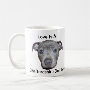 Liebe ist ein eigenständiges Logo und eine Welpe Tasse