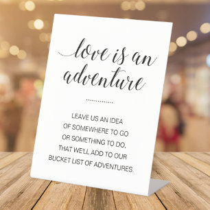 Liebe ist eine Adventure Travel Bucket List Hochze Sockelschild