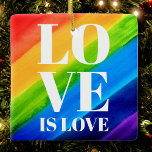 Liebe ist Liebe Rainbow Gay Pride Keramikornament<br><div class="desc">Liebe ist Liebe. Feiern Sie Liebe,  Gleichheit und den Juni-Pride-Monat. Dieses Pride-Ornament ist mit Regenbogenstreifen und stilvoller weißer Typografie auf einem wasserfarbenen Regenbogenhintergrund aus Rot,  Orange,  Gelb,  Grün,  Blau und lila. Original Wasserfarbe © Michele Davies.</div>