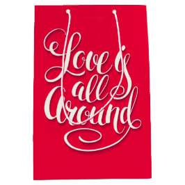 Liebe ist um die Schreibschrift pink herum Mittlere Geschenktüte