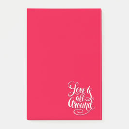 Liebe ist um die Schreibschrift pink herum Post-it Klebezettel