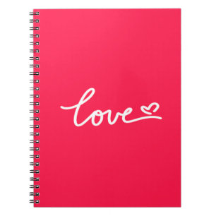 Liebe mit weißem Text auf rosa Notizblock