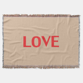 "Liebe" rote Buchstaben beigefarbener Hintergrund  Decke