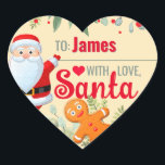 "Liebe, Santa" Gingerbret Custom Christmas Beige Herz-Aufkleber<br><div class="desc">Ein personalisierter und niedlicher Aufkleber "Mit Liebe,  Weihnachtsmann",  um Ihre Weihnachtsgeschenke anzubringen! Ändern Sie den Namen für ein individuelles Weihnachtsgeschenk vom Weihnachtsmann! Der Weihnachtsmann und ein Lebkuchenmann mit weihnachtlicher Vegetation auf beige/hellgelben Hintergrund.</div>