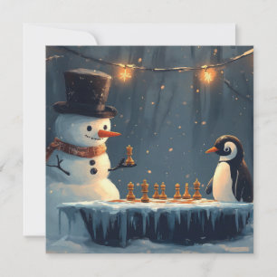 Liebenswerter Schneemann und Pinguin spielen Schac Feiertagskarte