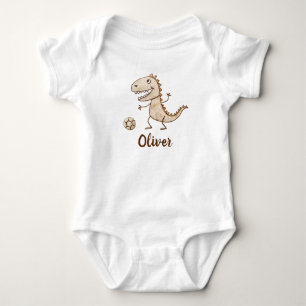Liebenswerter Trex spielt Fußball Baby Strampler