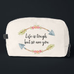 Life is Tough Watercolor Floral Arrow Cream Waschbeutel<br><div class="desc">"Life is tough, but so are you' motivational quote, framed top and bottom with beautiful watercolor tribal floral arrows, on a cream background. Perfect pick me up and positive vibes to remind you 'you are amazing' and 'you can do this', every time you reach for your Dopp Kit travel bag....</div>
