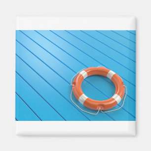 Lifebuoy auf blauem Boden Magnet