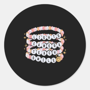 Lights-Kamera bringt Lächellehrer-Armband zurück Runder Aufkleber