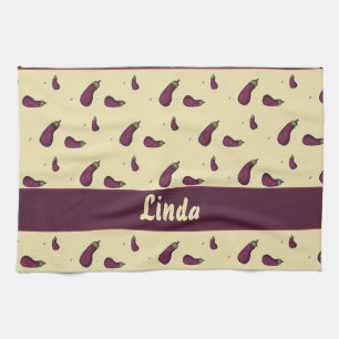 Lila Auberginen auf gelb Geschirrtuch