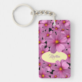 Lila Cosmos-Blume-Design auf schwarzem Hintergrund Schlüsselanhänger