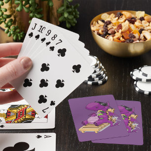 Lila Drache entspannt auf Liegestuhl Spielkarten
