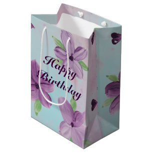 Lila floraler mittelgroßer Geschenkbeutel mit blau Mittlere Geschenktüte