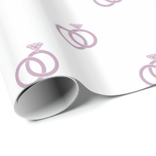 Lila Hochzeitsringe auf Weiß Geschenkpapier